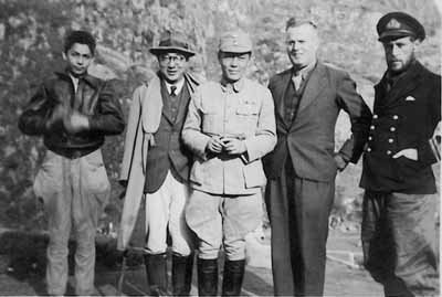 Lt C J Collingwood & Dr Robert Lim with civilian colleagues. 
	Dr Lim was a Lt-Gen in the Army and Surgeon-General of the Republic of China.  
	Click here to see more of Guiyang.  
	Photo from the Ashby Hide collection ©